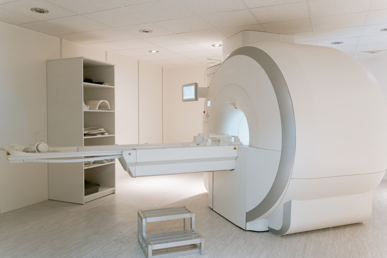 The scanner room at Wharfside, with the table out and the storage wall behind.